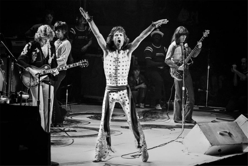 rolling stones performing mick arms raised all members on stage NEW YORK CITY 1972611.jpg